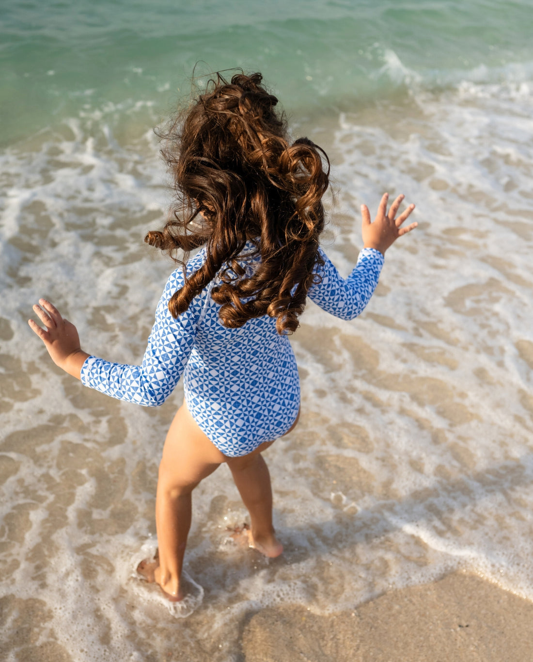 BAÑADOR NIÑA MANGA LARGA - Mediterranean Tiles